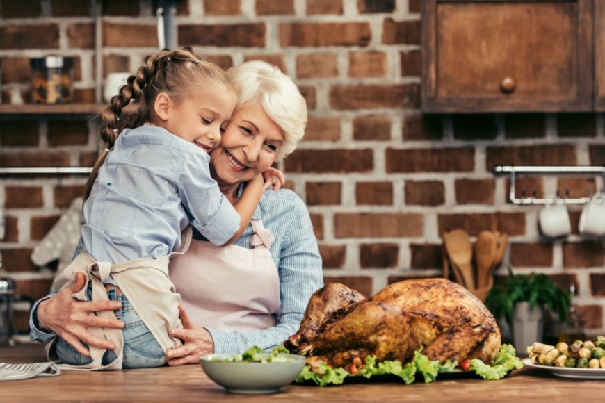 grandmother and granddaughter embracing on thanksgiving, thanksgiving, gratitude